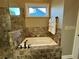 Close up of the bathtub with tile surround and glass shower in this bathroom at 3397 Holly Glen Dr, Dacula, GA 30019