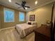 This charming bedroom is bathed in natural light from the two windows at 3397 Holly Glen Dr, Dacula, GA 30019