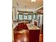 Kitchen features island, granite counters, and stainless refrigerator at 3397 Holly Glen Dr, Dacula, GA 30019