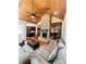 Comfortable living room features a fireplace, wood ceilings, and views into the kitchen at 3397 Holly Glen Dr, Dacula, GA 30019