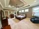 Spacious main bedroom features tray ceilings, carpet flooring, and lots of natural light at 3397 Holly Glen Dr, Dacula, GA 30019