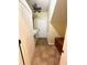 Mud room with tile flooring, storage, and laundry at 3397 Holly Glen Dr, Dacula, GA 30019