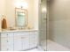 Bright bathroom featuring a shower and vanity with marble countertop at 4785 Brinkley Ln, Atlanta, GA 30342