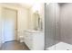 Modern bathroom features a sleek vanity, glass shower, and neutral color palette at 4785 Brinkley Ln, Atlanta, GA 30342