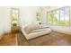Bright and airy bedroom with hardwood floors, large windows, and neutral decor, creating a serene retreat at 4785 Brinkley Ln, Atlanta, GA 30342