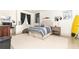 Relaxing bedroom with striped bedding and decorative surf board offers a unique design at 4785 Brinkley Ln, Atlanta, GA 30342