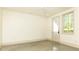 Bright room with a window offers a neutral canvas for your design ideas at 4785 Brinkley Ln, Atlanta, GA 30342