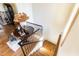 Grand foyer features hardwood floors, staircase, and decoratively appointed entry table at 4785 Brinkley Ln, Atlanta, GA 30342