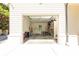 Well-lit garage featuring storage shelves and ample space, perfect for organizing tools and equipment at 4785 Brinkley Ln, Atlanta, GA 30342