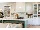 Well-appointed kitchen featuring a spacious island, tile backsplash, and open layout at 4785 Brinkley Ln, Atlanta, GA 30342