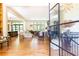 Sun-filled living room with hardwood floors, neutral décor, and open flow to the kitchen at 4785 Brinkley Ln, Atlanta, GA 30342