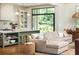 Open-concept living room flows into a gourmet kitchen, creating a comfortable space at 4785 Brinkley Ln, Atlanta, GA 30342