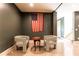 Sitting Room features decorative chairs and a chess set for casual conversations and games at 4785 Brinkley Ln, Atlanta, GA 30342