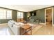 Living room with large windows and stylish decor offers a relaxing space for entertaining at 4785 Brinkley Ln, Atlanta, GA 30342