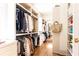 Spacious walk-in closet with custom shelving and ample storage for clothes and accessories at 4785 Brinkley Ln, Atlanta, GA 30342