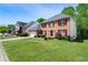 Beautiful brick-front home with manicured lawn, lovely landscaping, and an attached two-car garage at 930 Palmer Rd, Lithonia, GA 30058