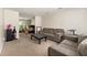 Inviting living room features neutral tones and ample seating, perfect for relaxing and entertaining guests at 930 Palmer Rd, Lithonia, GA 30058