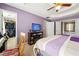 Comfortable bedroom with vaulted ceiling, natural light, and ample space for relaxing at 930 Palmer Rd, Lithonia, GA 30058