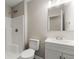 Well-lit bathroom with a white vanity, shower-tub combo, and modern fixtures at 1660 Mallard Cir, Conley, GA 30288