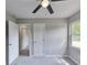 Bedroom with a ceiling fan, and carpet at 1660 Mallard Cir, Conley, GA 30288