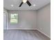 Carpeted room with ceiling fan at 1660 Mallard Cir, Conley, GA 30288