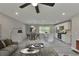 Modern open-concept living area seamlessly connects the kitchen and dining space, perfect for entertaining at 1660 Mallard Cir, Conley, GA 30288