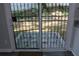 Sliding glass door leading to a stone patio and fenced backyard at 257 E Simon Nw Ter, Atlanta, GA 30318