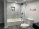 Modern bathroom featuring a shower-over-tub combination and sleek fixtures at 257 E Simon Nw Ter, Atlanta, GA 30318
