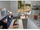 Open-concept living space with modern furniture, natural light, and a dining area at 257 E Simon Nw Ter, Atlanta, GA 30318