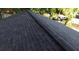 Close-up of new roof shingles and gutter system, showcasing durability and weather resistance at 257 E Simon Nw Ter, Atlanta, GA 30318