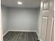 Versatile empty room featuring modern flooring and neutral walls, ready for customization at 257 E Simon Nw Ter, Atlanta, GA 30318