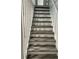 Stairway with light-colored risers and gray treads at 257 E Simon Nw Ter, Atlanta, GA 30318