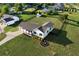 An aerial view of a charming home with a manicured lawn, black fencing, and a detached shed at 275 Crowe Springs Nw Rd, Cartersville, GA 30121