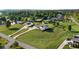 Expansive aerial view of a modern home on a large, well-manicured lot in a verdant, residential community at 275 Crowe Springs Nw Rd, Cartersville, GA 30121