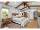 Bright bedroom with vaulted ceilings, exposed wood beams, and ample natural light at 275 Crowe Springs Nw Rd, Cartersville, GA 30121