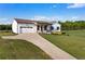 Charming home with a long driveway, well-manicured lawn, and inviting front porch at 275 Crowe Springs Nw Rd, Cartersville, GA 30121