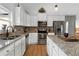 Well-equipped kitchen with stainless appliances, a brick backsplash, and granite counters at 275 Crowe Springs Nw Rd, Cartersville, GA 30121