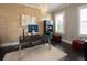 A bright home office featuring wood floors, natural light, neutral colors, modern furnishings and stylish decor at 4280 Castlewood Rd, Cumming, GA 30040