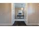 Home office behind french doors featuring wood floors, natural light, neutral colors, modern furnishings and stylish decor at 4280 Castlewood Rd, Cumming, GA 30040