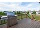 Spacious outdoor patio area with a grill and views of the neighborhood at 4280 Castlewood Rd, Cumming, GA 30040