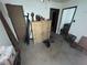 Bedroom shows closet and doorway alongside personal belongings in a state of disrepair at 6475 Church St, Atlanta, GA 30291