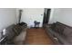The living room features two couches, hardwood floors, and a small table at 6475 Church St, Atlanta, GA 30291