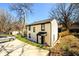 Charming two-story home with a well-manicured lawn and a driveway at 1051 Curran Nw St, Atlanta, GA 30318