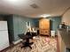 Basement with tile floor, table, storage, and utility sink at 5925 Tortosa Pl, Atlanta, GA 30349