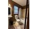 Standard bathroom including toilet, sink, and shower-tub combo at 5925 Tortosa Pl, Atlanta, GA 30349