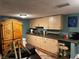 Kitchenette featuring ample cabinet space and a decorative hutch at 5925 Tortosa Pl, Atlanta, GA 30349