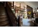 Open-concept living room with high ceilings and a striking stone fireplace at 5925 Tortosa Pl, Atlanta, GA 30349