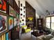 Cozy living room featuring a stone fireplace and eclectic decor at 5925 Tortosa Pl, Atlanta, GA 30349
