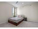 Bedroom with neutral walls and carpet with a queen bed and simple decor at 2436 Hidden Creek Road, Kennesaw, GA 30152