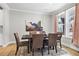 Cozy dining room with hardwood floors, stylish decor, and lots of natural light at 2436 Hidden Creek Road, Kennesaw, GA 30152